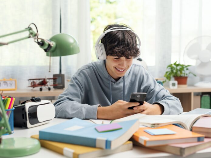Student connecting with his smartphone