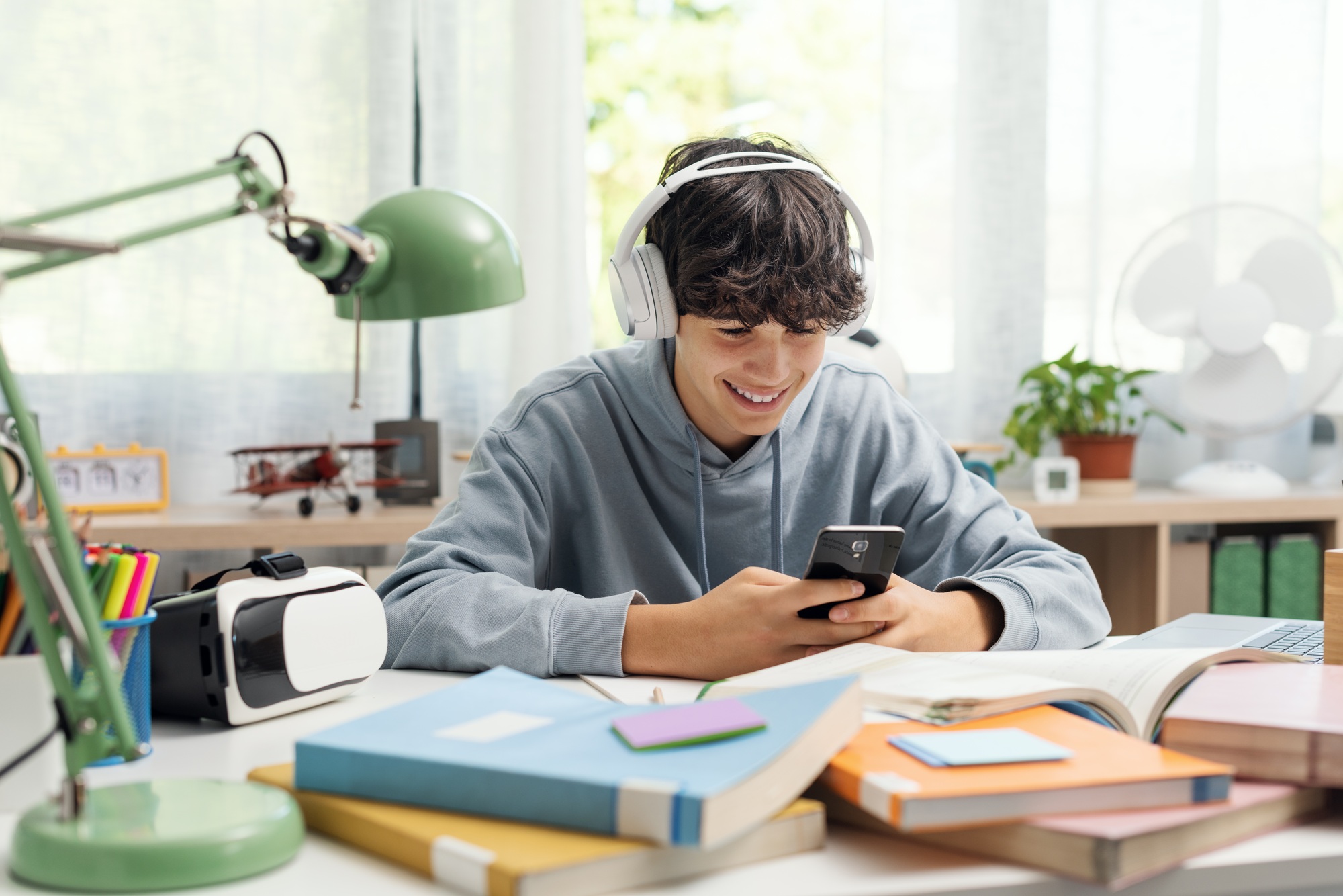 Student connecting with his smartphone
