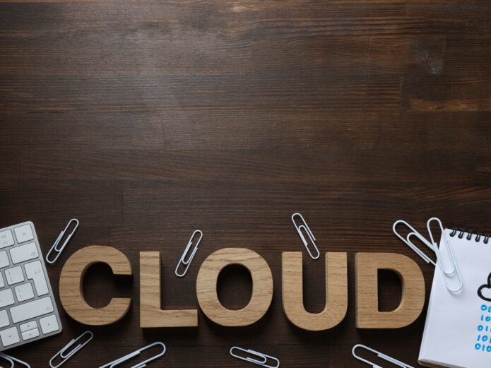 White, paper cloud with gadgets, cloud computing concept